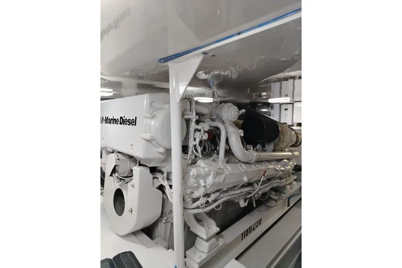  Yacht Photos Pics Engine room of 2002 Viking 55 Convertible yacht with marine diesel engine.