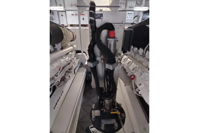  Yacht Photos Pics Engine room of 2002 Viking 55 Convertible yacht, showcasing mechanical components.