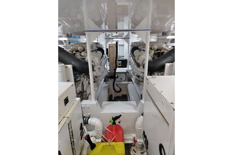  Yacht Photos Pics Engine room of 2002 Viking 55 Convertible yacht, showcasing machinery and components.