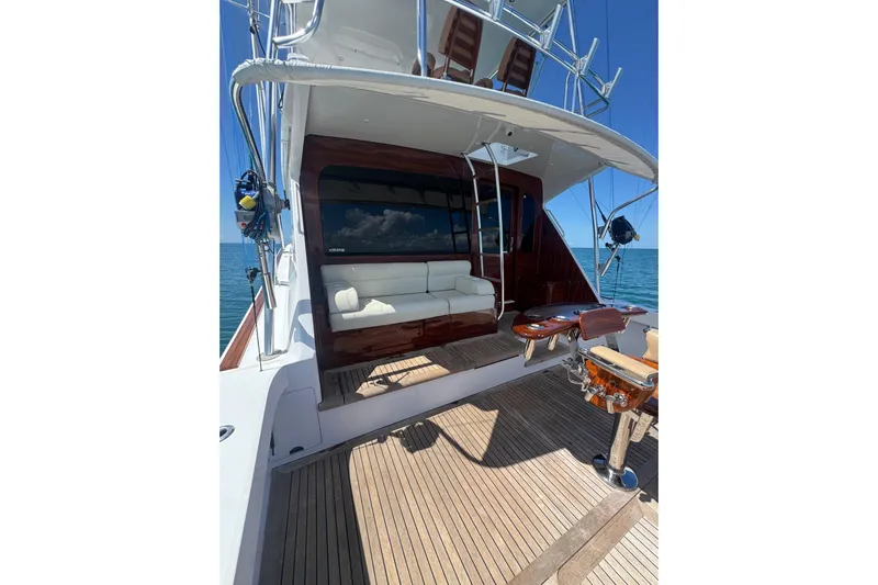  Yacht Photos Pics 2002 Viking 55 Convertible yacht with spacious deck and seating area.