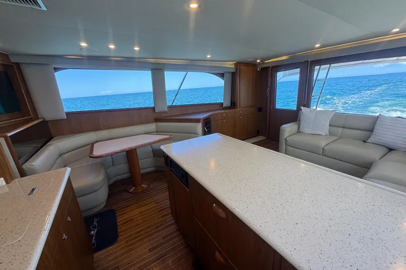  Yacht Photos Pics Luxurious interior of 2002 Viking 55 Convertible yacht with ocean view.