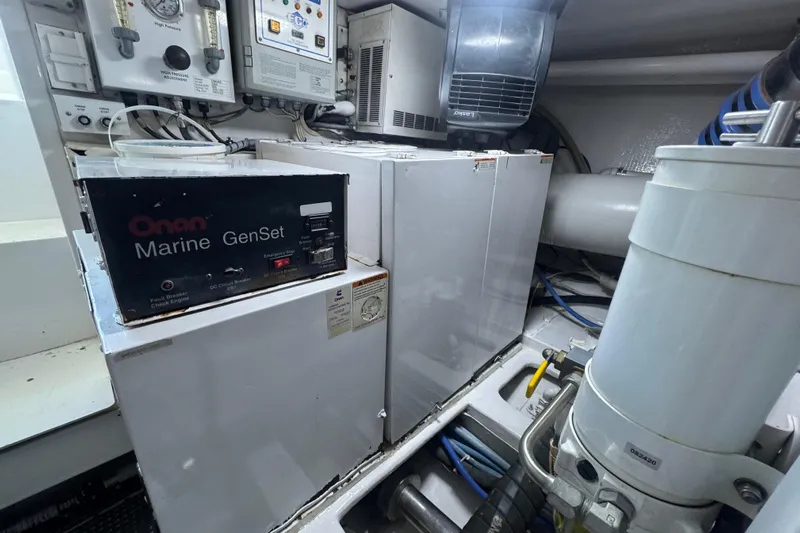  Yacht Photos Pics Engine room of 2002 Viking 55 Convertible with Onan Marine GenSet.