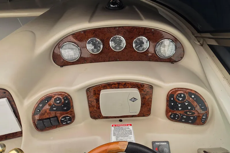  Yacht Photos Pics Dashboard of a 2007 Sea Ray 340 Sundancer boat with gauges and controls.
