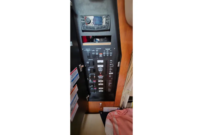  Yacht Photos Pics Electrical control panel inside 2007 Sea Ray 340 Sundancer boat cabin.