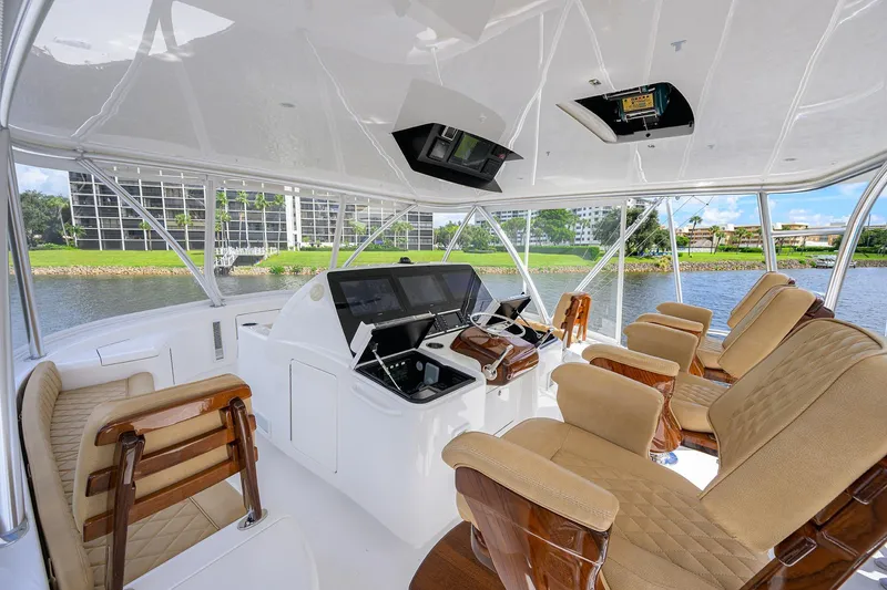 Hmy Trade Yacht Photos Pics 2023 Viking 64 Convertible - Helm Seating and Electronics