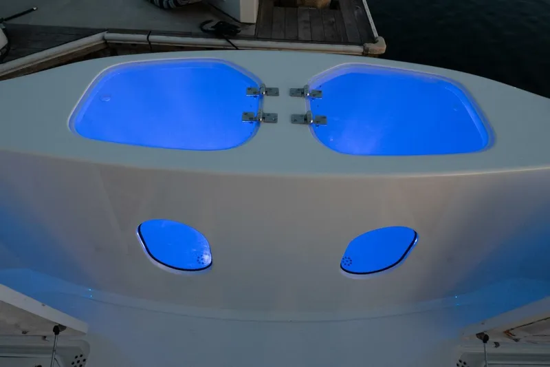 Ok'd By Dad Yacht Photos Pics Livewell compartments with blue lighting on a 2001 Mikelson 61 Yachtfisher.
