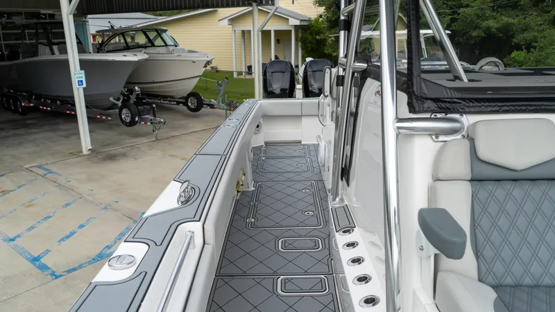  Yacht Photos Pics 2021 Invincible 37 Catamaran with sleek deck design and modern seating.