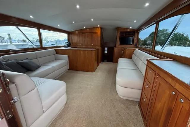 Sea Hag Yacht Photos Pics Luxurious interior of 2008 Blackwell Custom Carolina 61 yacht with elegant wood finishes.