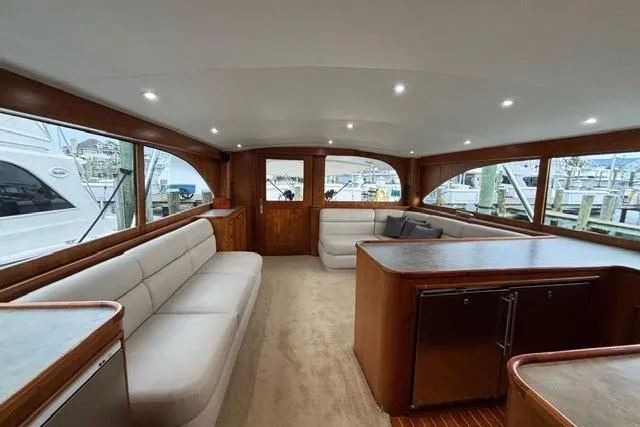 Sea Hag Yacht Photos Pics Luxurious interior of 2008 Blackwell Custom Carolina 61 yacht with elegant wood finishes.