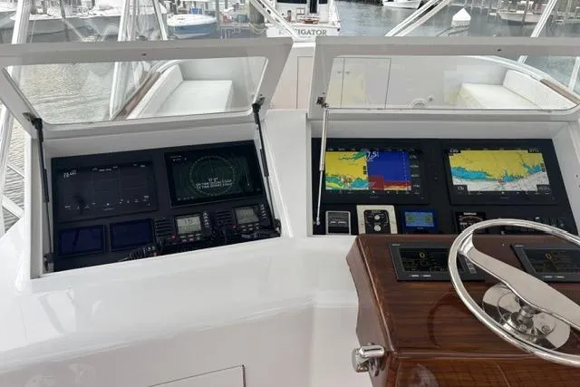 Sea Hag Yacht Photos Pics Helm of 2008 Blackwell Custom Carolina 61, featuring advanced navigation displays and controls.