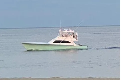 Sea Hag Yacht Photos Pics 2008 Blackwell Custom Carolina 61 yacht cruising on calm waters.