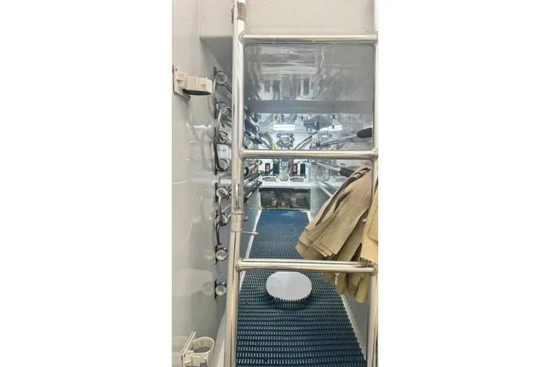 Sea Hag Yacht Photos Pics Engine room of 2008 Blackwell Custom Carolina 61 Carolina Custom yacht, featuring ladder and equipment.