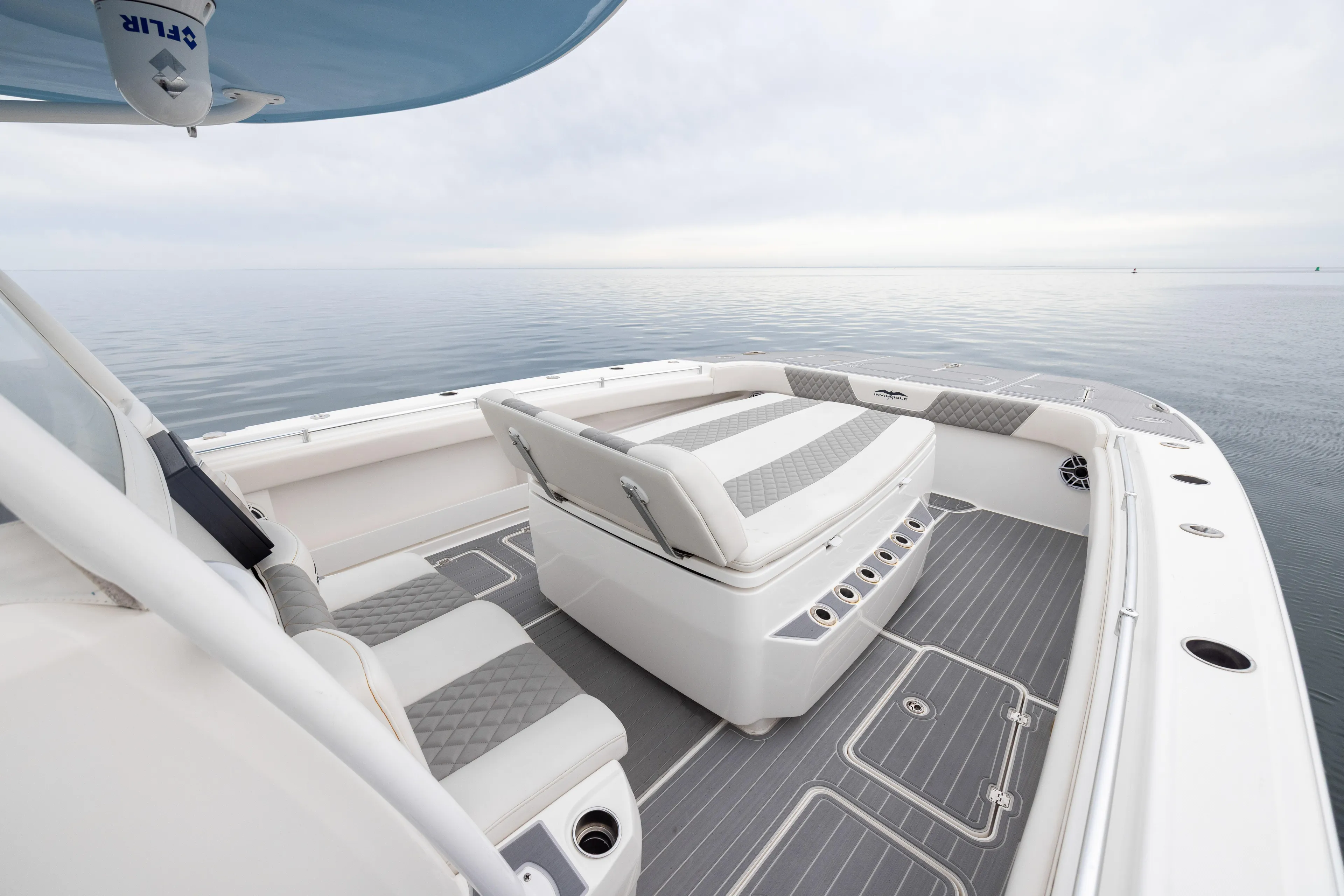  Yacht Photos Pics 2020 Invincible 40 Catamaran interior with luxurious seating on calm waters.