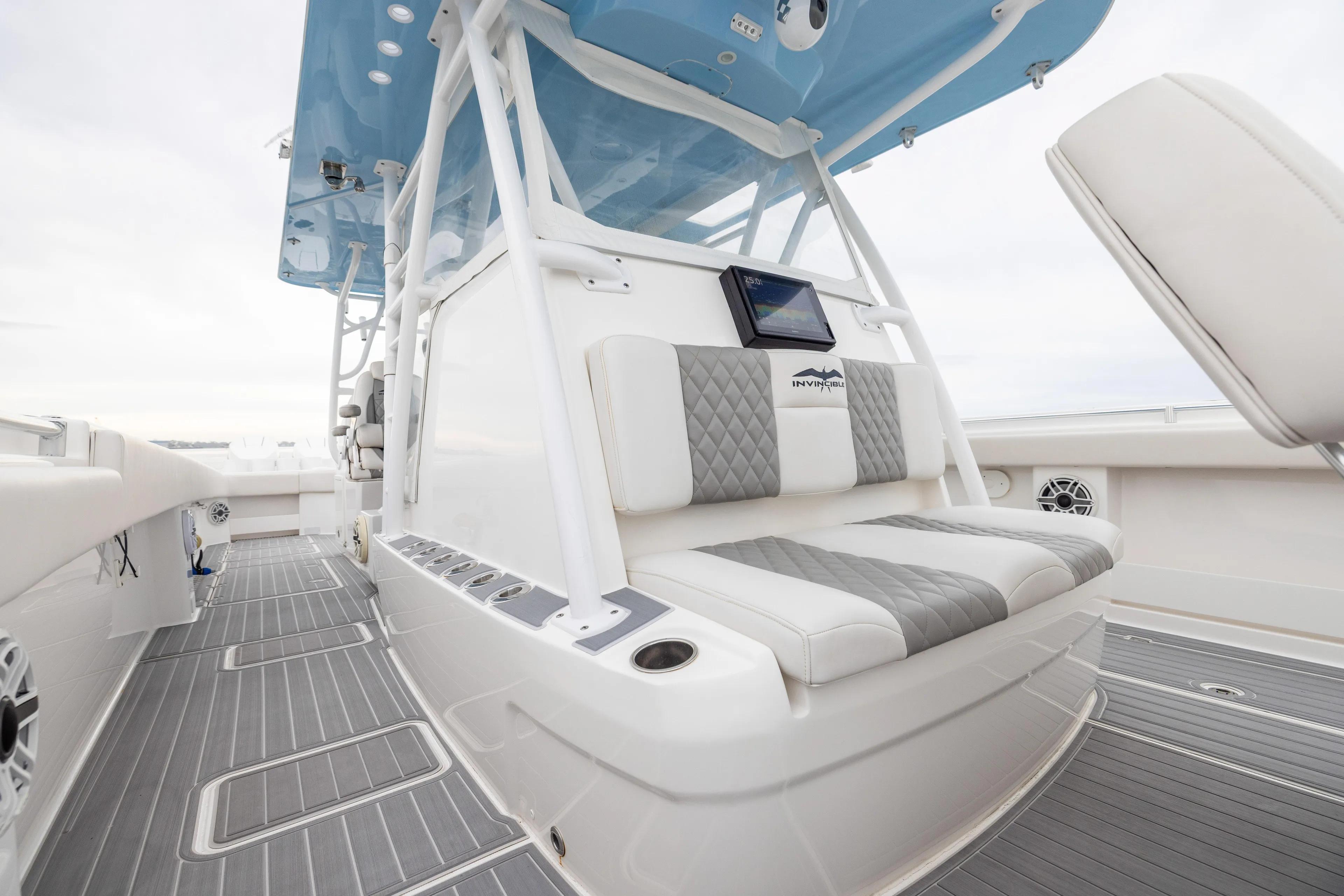  Yacht Photos Pics 2020 Invincible 40 Catamaran interior with cushioned seating and modern design.
