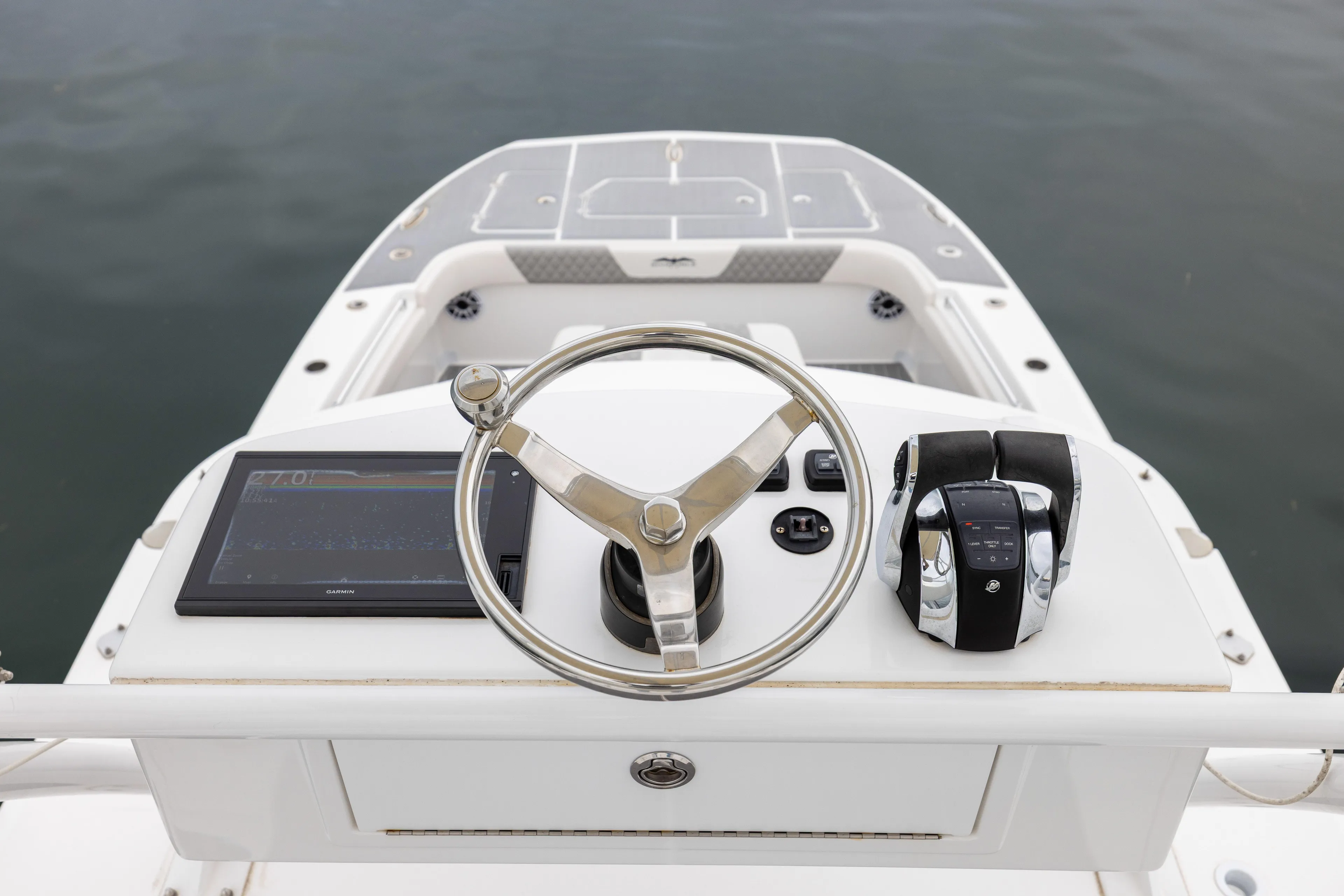  Yacht Photos Pics Steering console of 2020 Invincible 40 Catamaran with navigation display and controls.