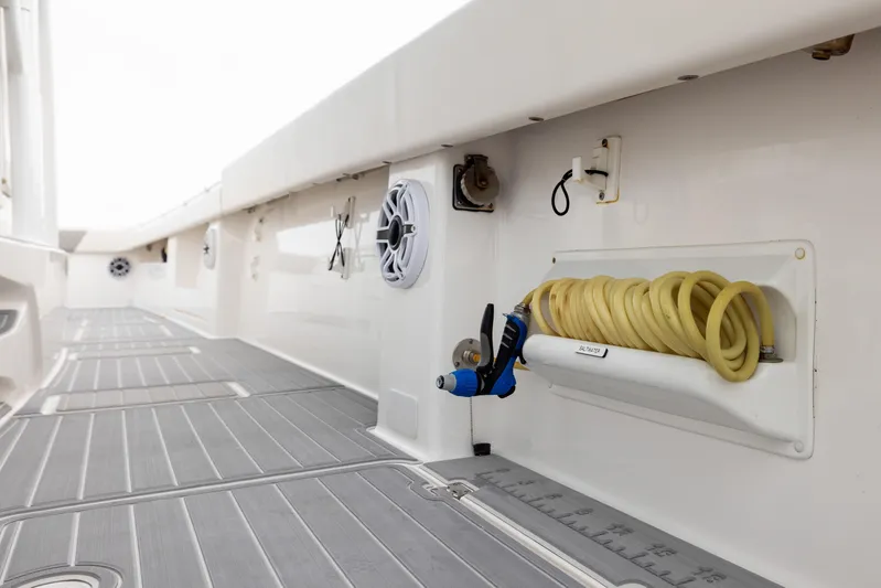  Yacht Photos Pics Interior view of 2020 Invincible 40 Catamaran with coiled hose and speakers.