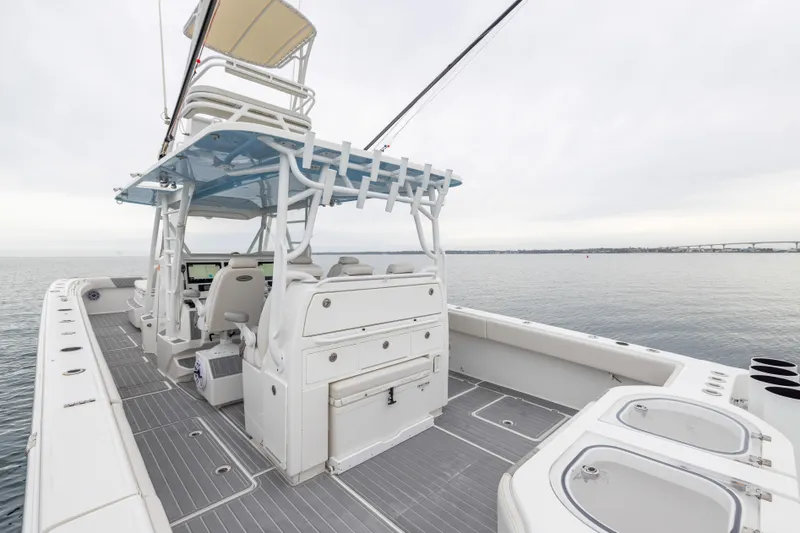  Yacht Photos Pics 2020 Invincible 40 Catamaran with spacious deck and modern helm on calm waters.