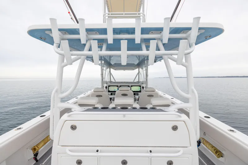  Yacht Photos Pics 2020 Invincible 40 Catamaran interior with helm, seating, and ocean view.