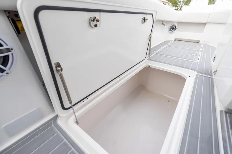  Yacht Photos Pics Open storage compartment on 2020 Invincible 40 Catamaran boat deck.