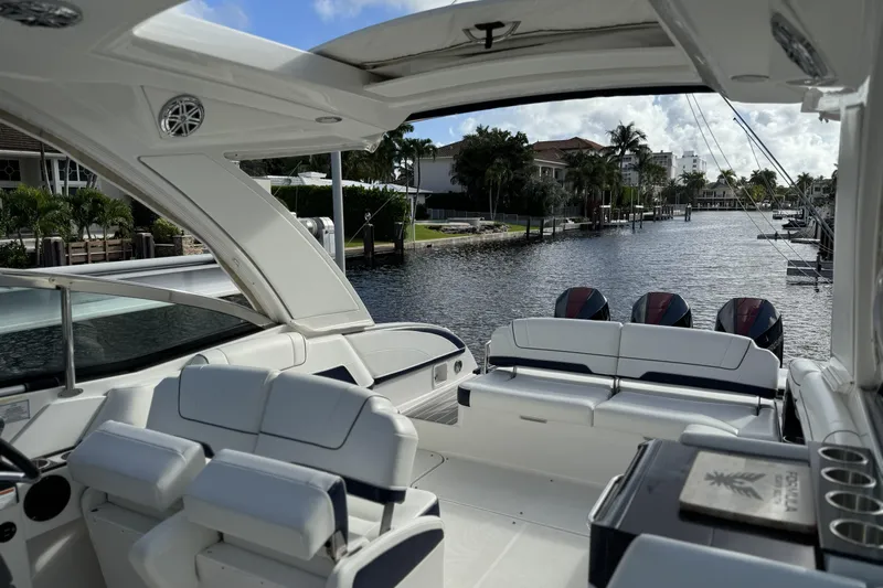  Yacht Photos Pics 2021 Formula 330 Crossover Bowrider OB, luxury boat interior, canal view.