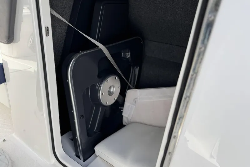  Yacht Photos Pics 2021 Formula 330 Crossover Bowrider OB interior storage compartment with secured equipment.