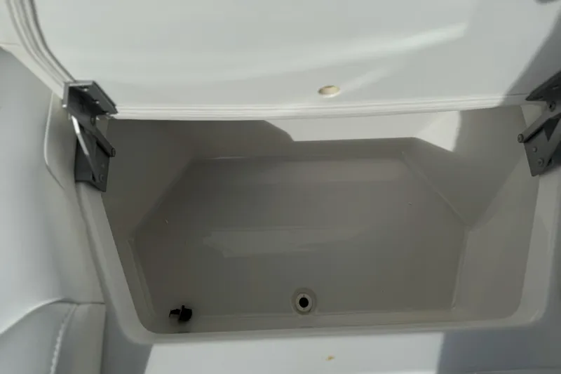  Yacht Photos Pics Open storage compartment in 2021 Formula 330 Crossover Bowrider OB boat.
