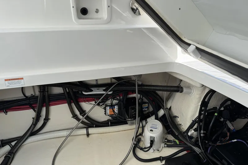  Yacht Photos Pics 2021 Formula 330 Crossover Bowrider OB engine compartment with wiring and components.