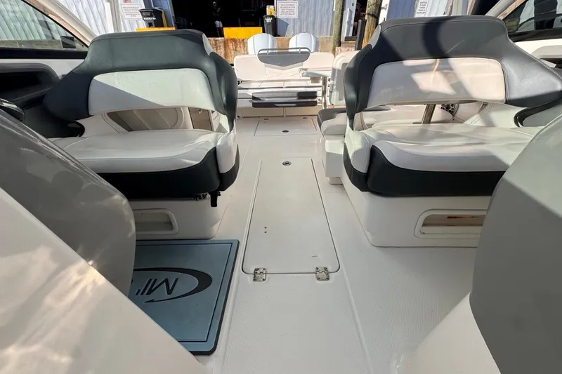  Yacht Photos Pics 2021 Robalo R317 Dual Console boat interior with comfortable seating and spacious layout.