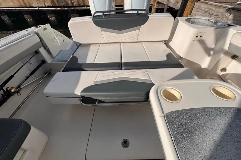  Yacht Photos Pics 2021 Robalo R317 Dual Console boat interior with seating and cup holders.
