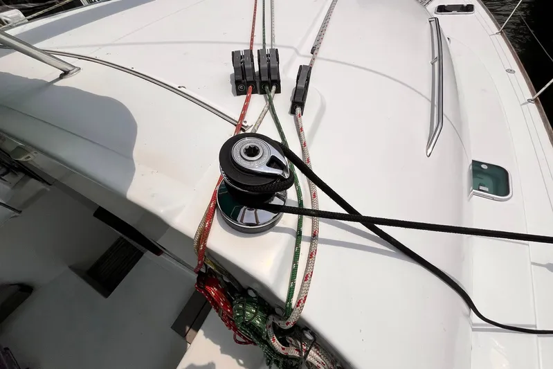 Wayward Sun Yacht Photos Pics Deck of 2000 Lagoon 380 catamaran with winch and ropes.