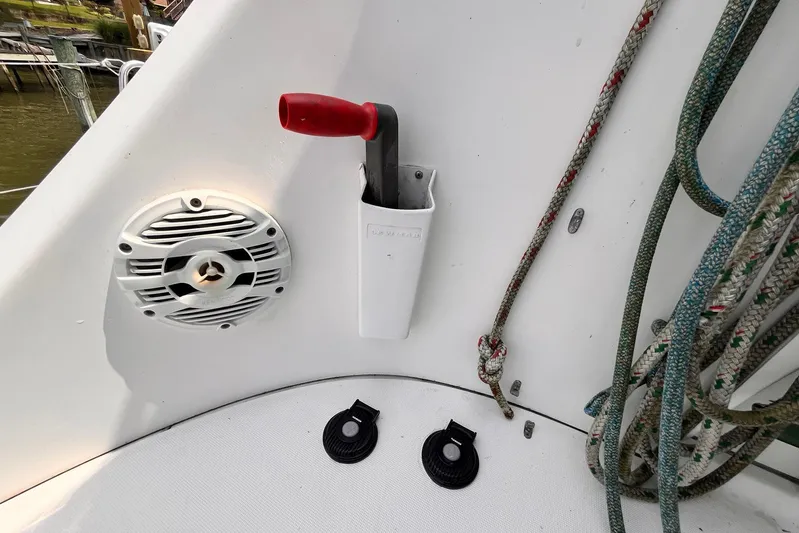 Wayward Sun Yacht Photos Pics Lagoon 380 sailboat cockpit with speaker, ropes, and winch handle holder, 2000 model.