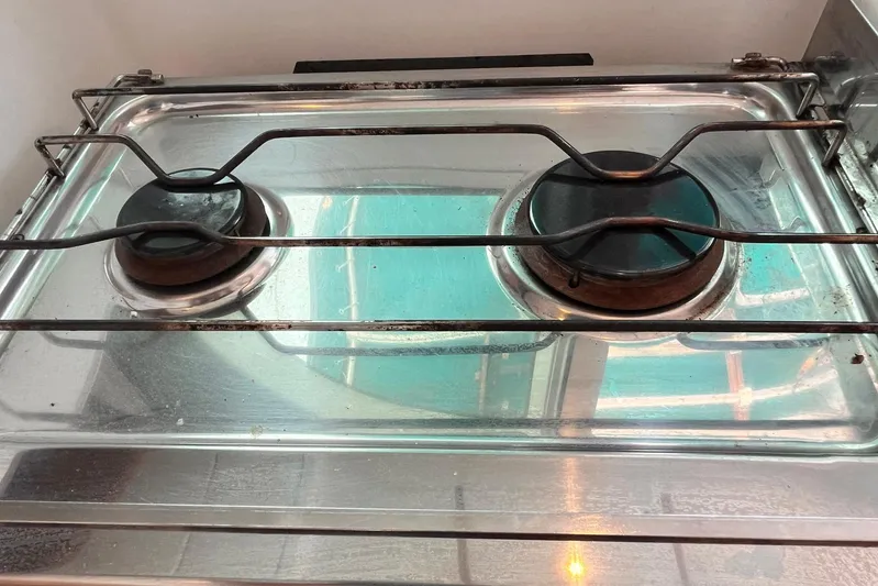 Wayward Sun Yacht Photos Pics Stainless steel stove with two burners on a Lagoon 380, year 2000.