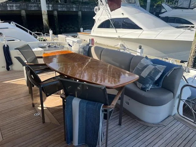 Hydrogène Yacht Photos Pics Teak Table and Chairs on Cockpit