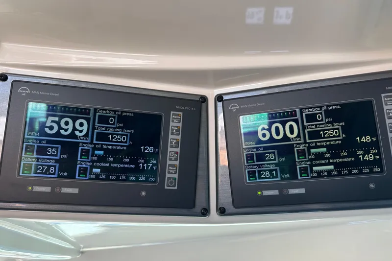 Ohana Yacht Photos Pics Digital control panels on a 2007 Sea Ray 60 Sundancer yacht displaying engine metrics.