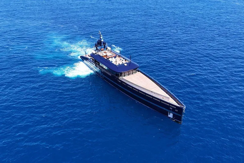 Blade II Yacht Photos Pics Luxury yacht MMGI BLADE II 2009 cruising on open blue sea.