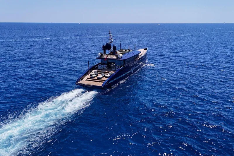 Blade II Yacht Photos Pics Luxurious MMGI BLADE II yacht cruising on open sea, 2009 model.