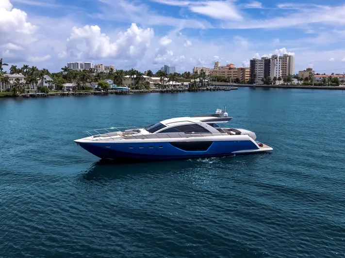 Bikinis Optional Yacht Photos Pics Luxury 2012 Cheoy Lee 76 Alpha yacht cruising on serene blue waters.