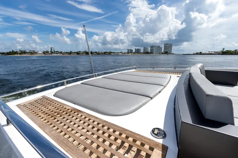 Bikinis Optional Yacht Photos Pics Luxury 2012 Cheoy Lee 76 Alpha yacht with sunbathing deck on open water.