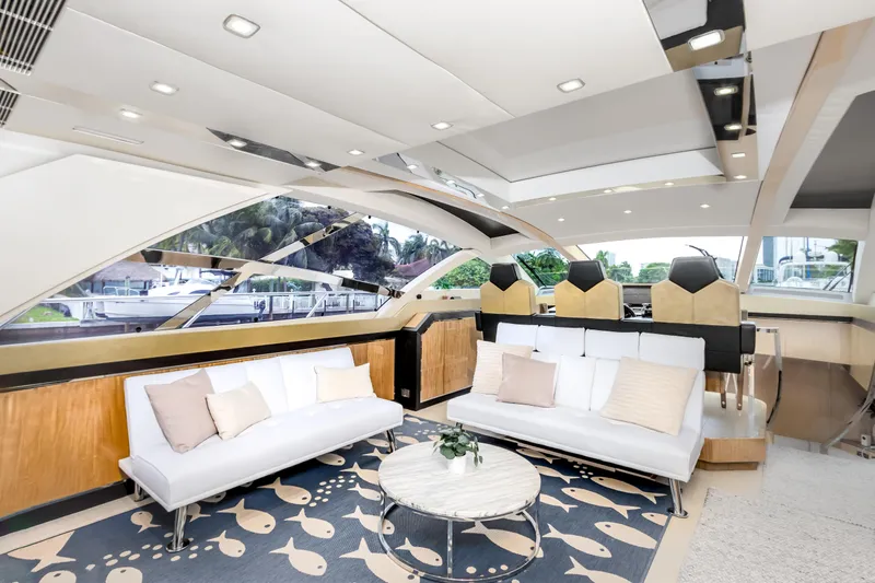 Bikinis Optional Yacht Photos Pics Luxurious interior of 2012 Cheoy Lee 76 Alpha yacht with modern seating and elegant decor.