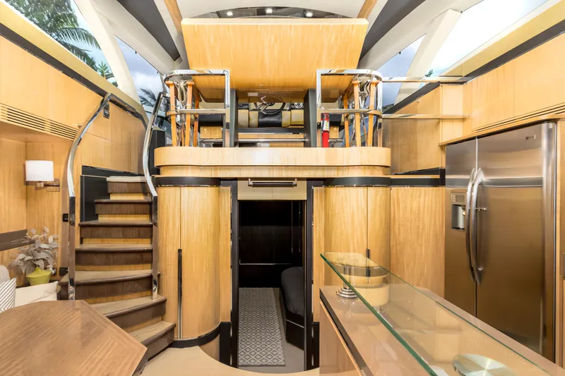 Bikinis Optional Yacht Photos Pics Interior of 2012 Cheoy Lee 76 Alpha yacht with modern wood finishes and stainless steel appliances.