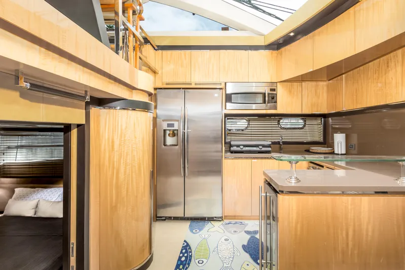 Bikinis Optional Yacht Photos Pics Luxurious kitchen interior of 2012 Cheoy Lee 76 Alpha yacht with modern appliances.