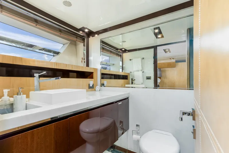 Bikinis Optional Yacht Photos Pics Luxurious bathroom interior of 2012 Cheoy Lee 76 Alpha yacht with modern fixtures.