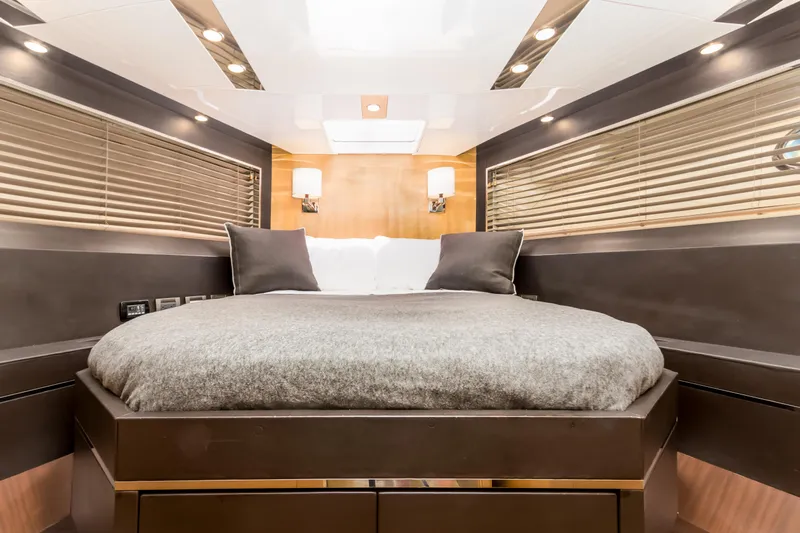 Bikinis Optional Yacht Photos Pics Luxurious bedroom interior of 2012 Cheoy Lee 76 Alpha yacht with modern design and cozy bedding.