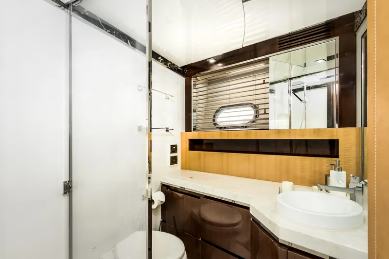 Bikinis Optional Yacht Photos Pics Luxurious bathroom in 2012 Cheoy Lee 76 Alpha yacht with modern fixtures and elegant design.