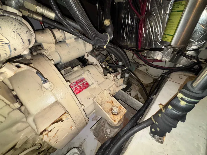  Yacht Photos Pics Engine room of 1993 Carver 440 Aft Cabin Motor Yacht with visible mechanical components.