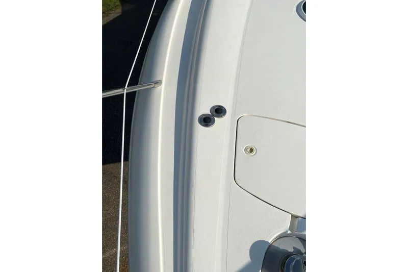  Yacht Photos Pics Close-up of 1998 Sunseeker Predator 58 yacht deck, showcasing sleek design and fittings.