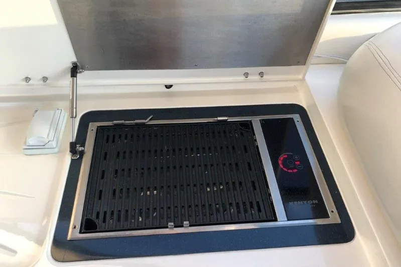  Yacht Photos Pics Built-in grill on 1998 Sunseeker Predator 58 yacht, featuring sleek design and modern controls.