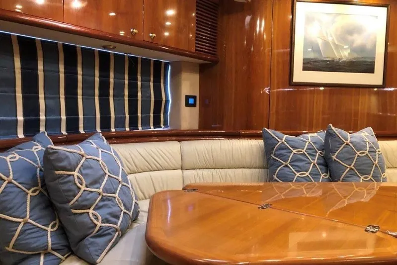  Yacht Photos Pics Luxurious interior of 1998 Sunseeker Predator 58 yacht with elegant seating and decor.