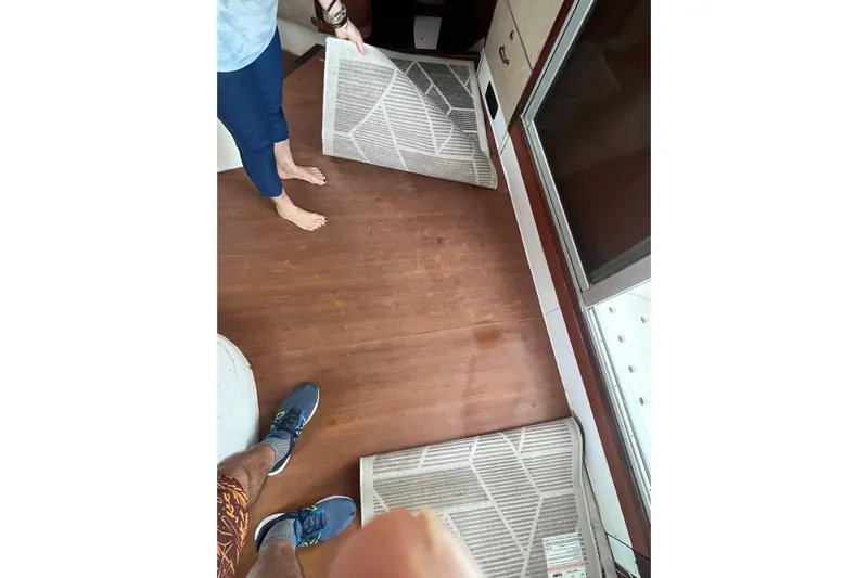 Nikita 1 Yacht Photos Pics People cleaning air filters on a 2004 Fountaine Pajot Bahia 46 catamaran.