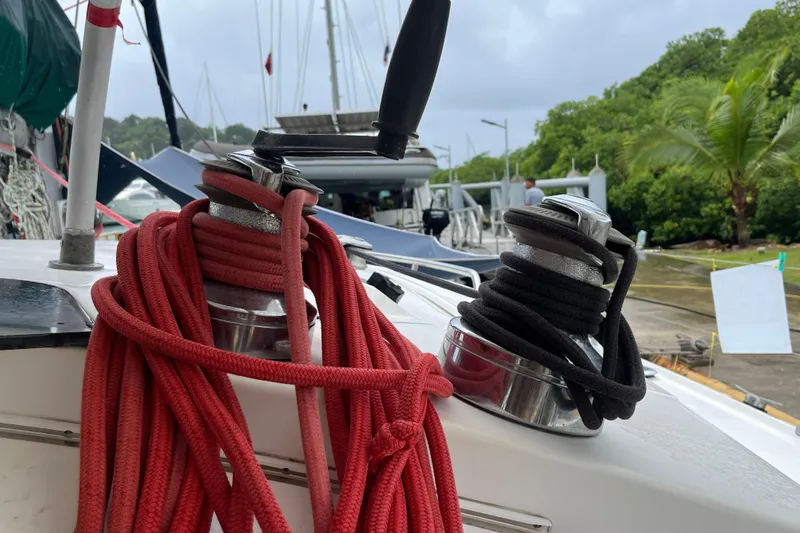 Nikita 1 Yacht Photos Pics Close-up of winches with red and black ropes on a 2004 Fountaine Pajot Bahia 46 catamaran.